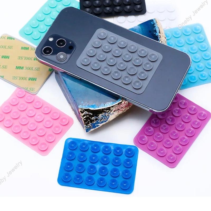 Silicone phone suction Adhesive mount Accessories sticks to flat surfaces only . Please read description